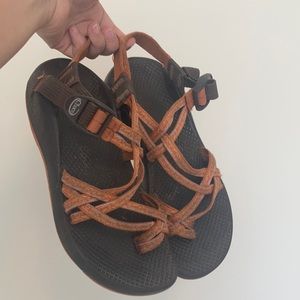 Orange and brown Chacos